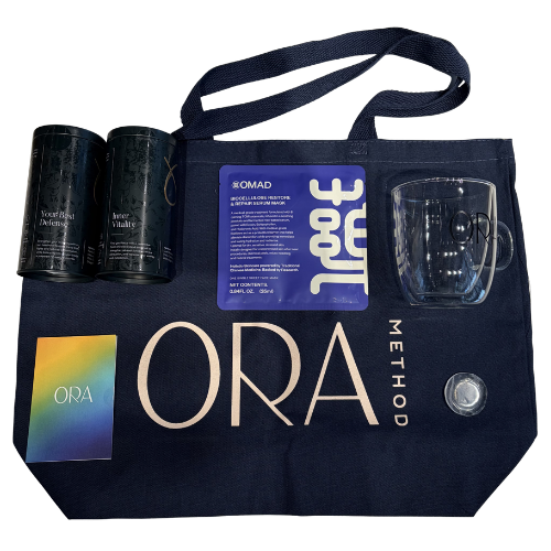 Navy ORA Method™ tote bag, ORA Best Defense Tea, ORA Inner Vitality Tea, OMAD single sheet mask, ORA glass mug, ORA ear seeds, clear quartz crystal